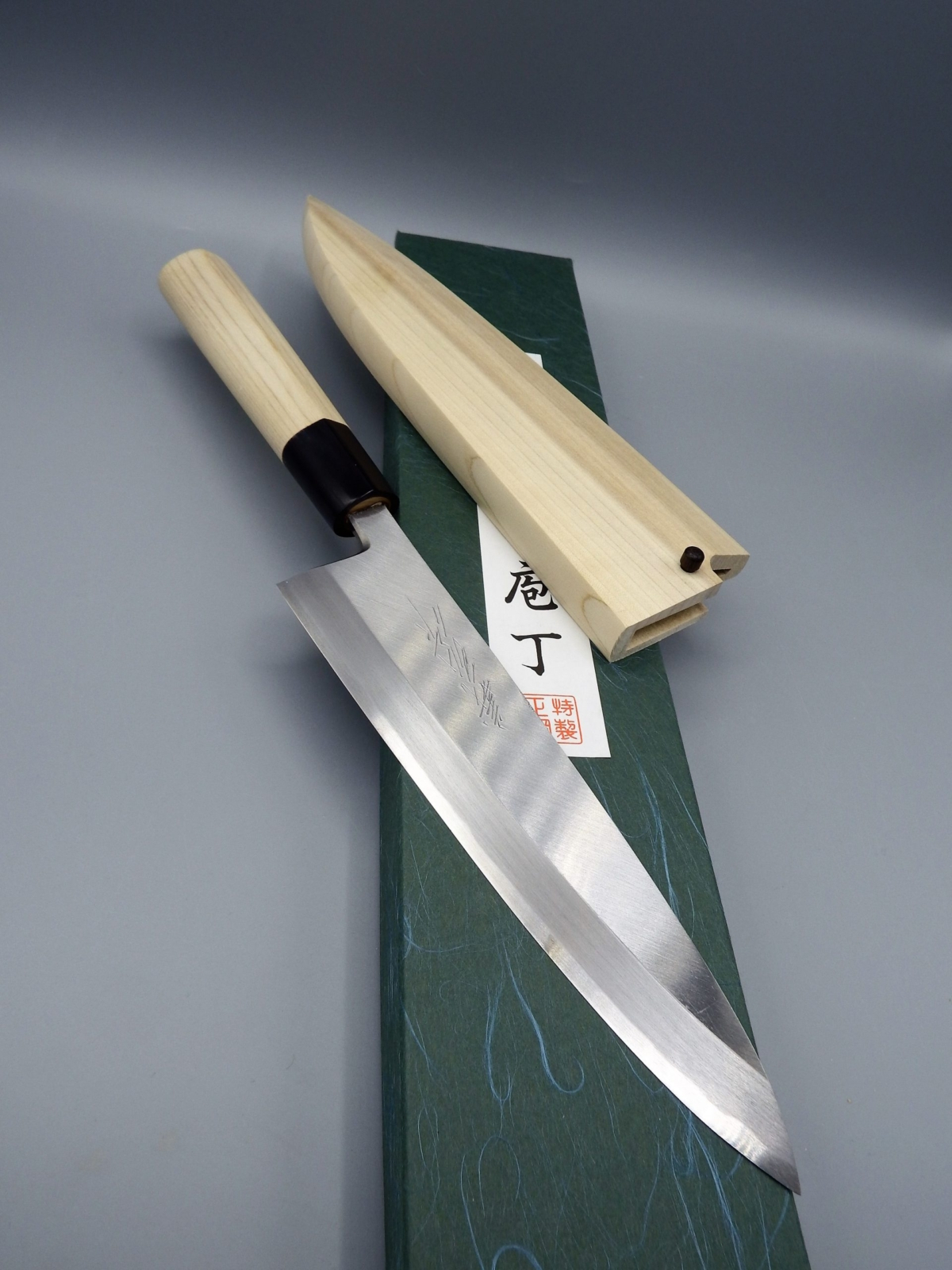 Yoshihiro Mioroshi Deba 180 mm in acciaio SK4 con Saya